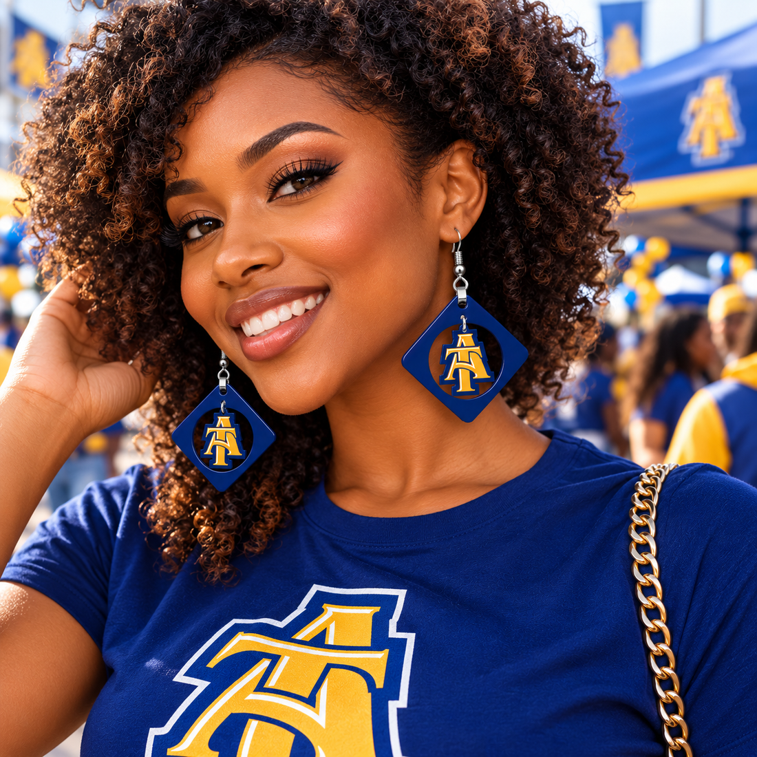 Navy frame diamond swing earrings worn for game day, blue and gold acrylic dangle earrings