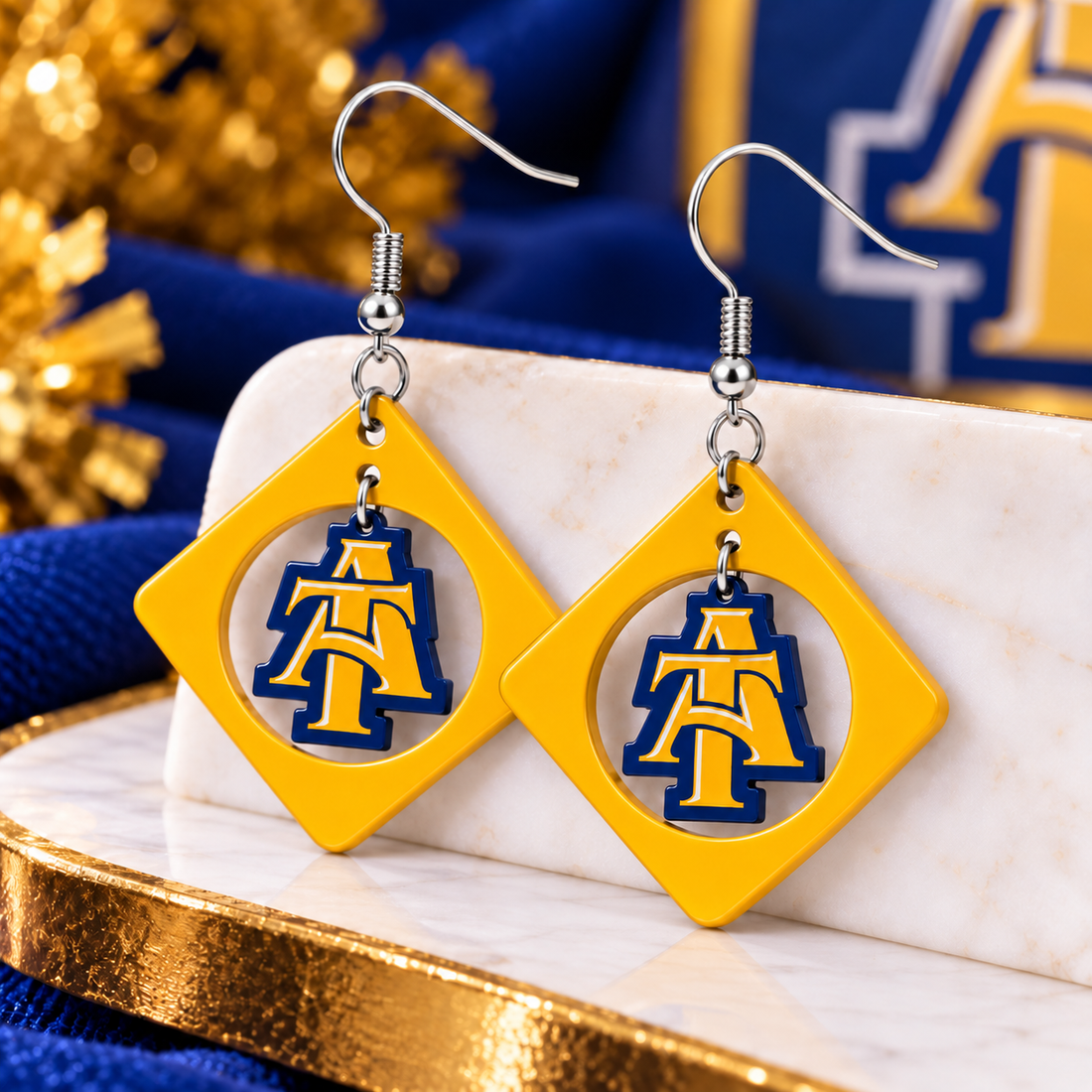 Gold frame diamond swing earrings with navy outlined gold center charm, acrylic dangle earrings